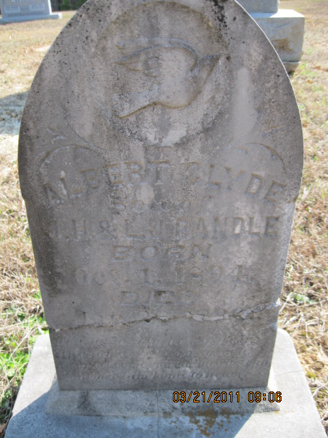Inscribed: Albert Clyde, Son of J. H. & L. J. Randle. Born Oct. 1, 1894. Died Jan. 28, 188? (cannot be read due to crack in tombstone)