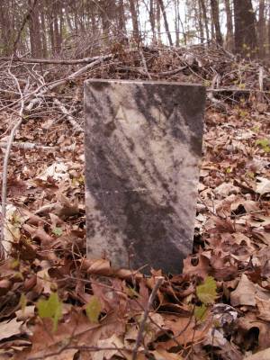 Original tombstone for Albert Mitchel (inscribed simply "A M")