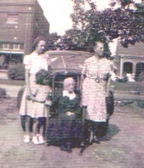 c. 1937 -- Standing: Betty Elizabeth Bruce (Front Left), Lorene Smith Bruce (Rear Left), Gussie Randall Smith (Standing, Right), Elizabeth Mahaley Gwynn Randall (seated).((http://www.genealogy.com/ftm/b/r/u/Jack-R-Bruce/PHOTO/0087photo.html))