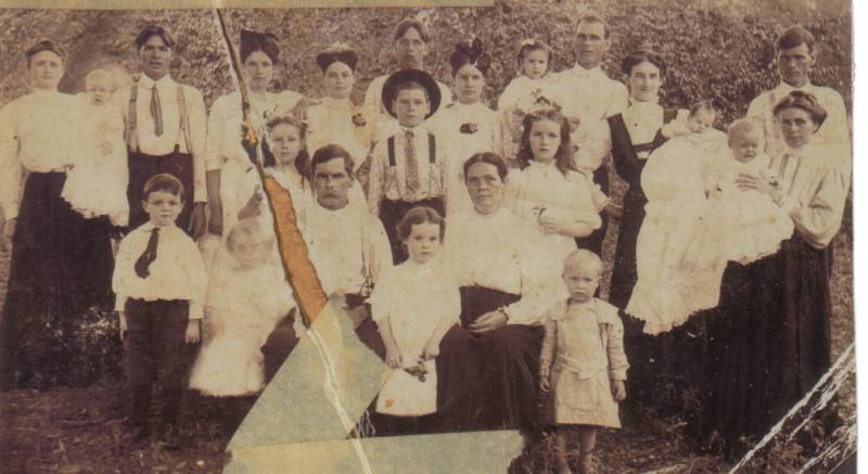 Chunn Family reunion. Seated in the middle are Newton Jasper Chunn and his wife, Nancy "Nannie" Jane Randle-Chunn. They are surrounded by their children and grandchildren.