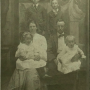 martha_jane_janie_randall-verdie_fronie_in_mothers_lap-grady_in_fathers_lap-john_robert_randall-clarence_clyde_standing.png
